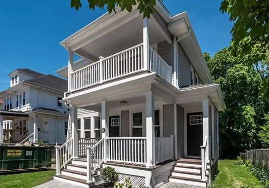 After shot of the same house that has been completely renovated.